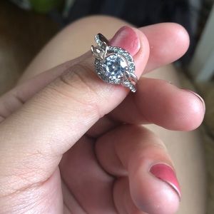 Silver colored diamond ring
